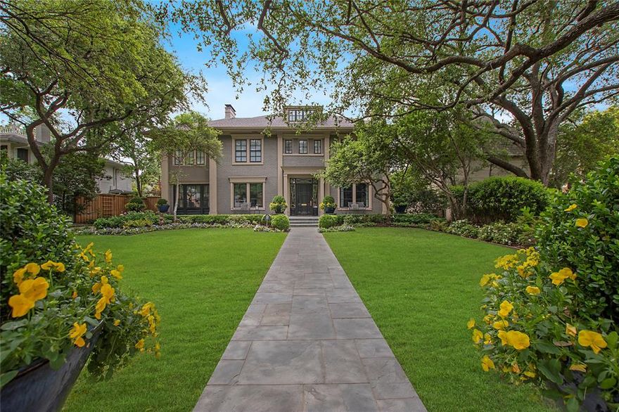 This historic gem graces one of Highland Park's most coveted tree lined streets, close to Turtle Creek & Armstrong Elementary. Meticulously updated, the main level features diamond-shaped parquet oak floors & a bright kitchen seamlessly integrated with the family dining & living area, framed by a wall of windows. Outside, a serene retreat awaits with a limestone wood burning fireplace, outdoor kitchen, turfed yard, dog run.  The large beautiful pool is inviting with water feature. Generously sized bedrooms, each with its own en-suite bath. Primary bedroom has dual baths & private sitting room. The third floor bonus room can serve as a 5th bedroom with en suite bath, closet & cedar closet. A rare highlight is the extensive detached 1230 sq.ft. guest quarters with 2 bedrooms, 2 baths, & full kitchen, attached to the 3-car garage. Notably, this home was showcased in the Park Cities Historic & Preservation Society Home Tour in 2019.
