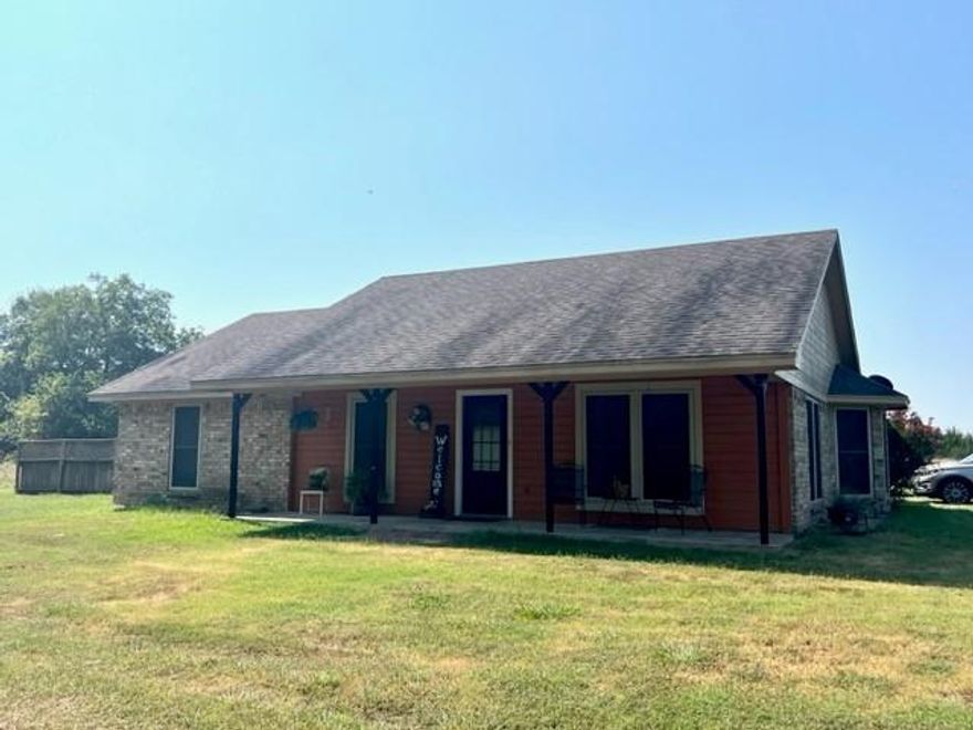 Come to the country and enjoy wide open spaces and starlit nights! Spacious living room with tray ceiling accent, vinyl plank flooring and plenty of natural light. Kitchen is open to breakfast room with a movable breakfast bar. Primary bedroom, generous size, has double closet and full bath. Two additional bedrooms and hall bath complete the floor plan. Utility room is just inside the back door and can accommodate more storage along with the washer-dryer. Want a garden? Perfect area already marked off to get that winter planting in. Two storage buildings on site for lawn equipment and things you want out of your house. Plenty of room for a horse, chickens or maybe even a couple of goats