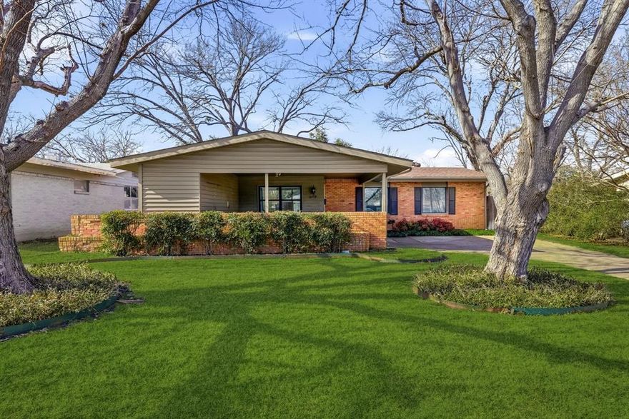 Welcome to 6719 Santa Anita Drive, a beautifully maintained 3-bedroom, 2-bath home offering 1,417 square feet of comfortable living in one of East Dallas’ most desirable locations. Nestled just minutes from White Rock Lake and the heart of Lakewood, this home combines classic charm with everyday functionality.

Inside, you’ll find warm wood floors flowing throughout the living spaces and bedrooms, creating a cohesive and inviting feel. The spacious living area is filled with natural light and opens easily to the dining and kitchen spaces, making it ideal for both daily living and entertaining. The kitchen features ample cabinetry and counter space with beautiful updates, including a built-in wine cooler.

The primary bedroom includes an en-suite bath, while two additional bedrooms offer flexibility for guests, a home office, or growing needs. Both bathrooms retain their timeless character while incorporating thoughtful updates. A separate laundry room with ample storage adds convenience.

Situated on a generous 0.172-acre lot, the large backyard is a true highlight - perfect for outdoor entertaining, gardening, pets, or future expansion. A covered patio provides a shaded retreat and extends your living space outdoors. NEW ROOF!

Enjoy the unbeatable location with quick access to White Rock Lake trails, Lakewood shopping and dining, and major Dallas thoroughfares - all while being tucked away on a quiet residential street. This home offers the perfect blend of location, charm, and livability - an exceptional opportunity in the heart of East Dallas.