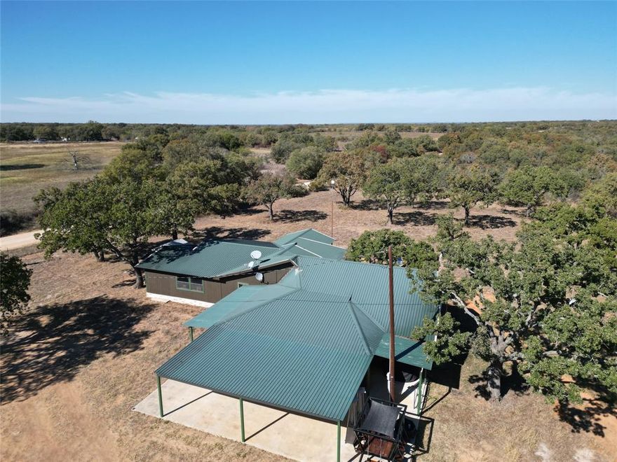 Don't miss this beautiful Home and 166 acres of piece and quite out of the city. This heavily wooded land and home can be your new home or just vacation get away. The house is ready to go with a kitchen that has all appliances in place and ready for family. All furniture in home will also convey. Just a short walk from home a scenic outlook awaits complete with covered cement viewing area with firepit and swing. There is a large shop for all your toys and farming equipment to be safely stored inside and a pump house which contains a 2000-gallon water tank that is fed by rural water and then goes onto the house. There is a well just outside of home that can also supply water. There are 2 deer blinds and 4 feeders that will convey and are currently feeding. As well as food plots. The many trees and ponds supply ample cover and water for all wildlife and cattle. There is over 100 feet of elevation change that will have you looking down at a beautiful valley or gazing up at the many rolling hills. There is an additional 140 acres that joins this property that are available also. There is to much to talk about on this property so make your appointment today and let me show you first hand what could be yours.