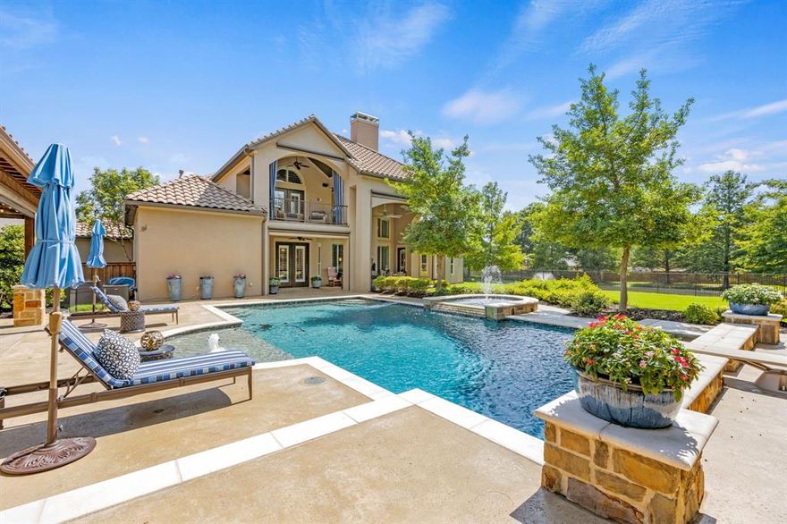Priced 100K below appraisal + additional 100K of seller upgrades. Premier Southlake retreat featuring open concept + indoor,outdoor living w 4 verandas + 4 water features, outdoor kitchen + enormous green space adjecent to pond. State-of-the-art media + separate game w large walk-in kitchen + outdoor terrace. First floor primary suite w large sitting area + 2 new lg custom closet systems, extra lg shower; first floor guest suite, convenient exercise room w wet bar + full bath + pool access. 2 gorgeous front + back sweeping staircases, lg handsome dual office, 2 story family room highlighted by towering stone FP, custom cabinetry, wine room, gourmet kitchen w top of the line appliances + custom cabinets, breakfast space that enjoys access to pool terrace. Gated green space, cabana, salt pool + 4 car gated garage. Recent upgrades include complete AV, Sonos, theater, Cat 5 + internet systems, salt pool + all exterior lighting + additional landscaping. Home may also be purchased furnished.