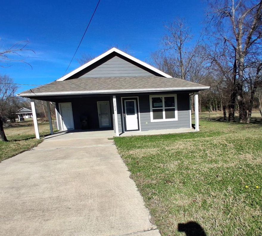Super cute home in Greenville Tx just waiting for a new owner. Move in ready with neutral colors throughout. This nearly new home comes with extensive upgrades. It offers three bedrooms and 2 full bathroom and a large open living, kitchen and dining area. The exterior has good curb appeal.  The view from the covered back porch makes you feel as though you're in the country. Located close to I30 for a convenient commute. Inside you will find recessed ceilings, vinyl flooring, granite counters and lush carpet in the bedrooms. This great home won't last long. Come take a look before it is gone! Sold AS-IS.