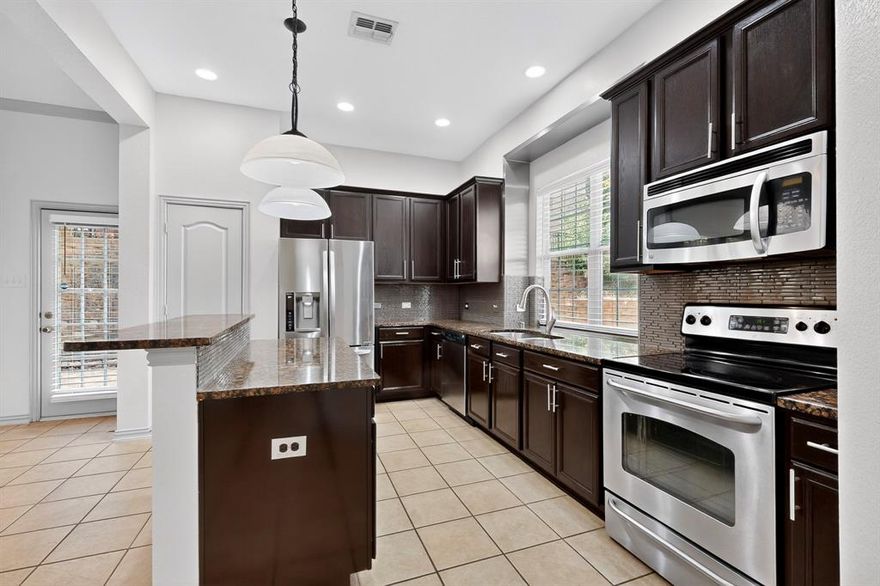 Updated David Weekley townhome with an open floor plan located in a cul-de-sac.  Spacious home with 10-foot ceiling on 1st floor and 9-foot on 2nd floor. The kitchen features granite countertops, 42 inch cabinets, entertaining eat-in island and stainless steel appliances. The large primary bedroom has a tray ceiling and an ensuite bath with a garden tub, separate shower, 2 sinks & walk-in closet. Upstairs are 2 additional bedrooms, built-ins and desk area. Enjoy one of the largest private backyards in the community and extra storage inside the garage.