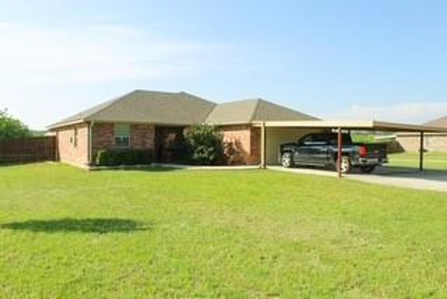 Rare opportunity to own a truly one of-a kind property just outside the city limits of Early, TX! Situated on 1.30 acres, this beautifully maintained 3 bedroom, 2 bath brick home offers the perfect blend of comfort, functionality, and outdoor living. The home features foam insulation throughout, an open-concept living and dining area, a charming kitchen with abundant cabinetry, and a spacious primary suite with dual vanities, large walk-in shower, and separate his-and-her closets. What sets this property apart is the incredible 30x40 fully insulated shop featuring a 3-ton mini split, on emand hot water heater, half bath, and a 12x40 covered concrete porch with fans, lighting, and roll-up door perfect for entertaining, projects, or workspace. Attached is a 20x40 lean-to ideal for boats, trailers, lawn equipment, or additional storage. The property is fully privacy fenced with an electric gated entrance, includes an ADT security system, BreezEV Level 2 car charger, and appliances in both the home and shop will convey. Enjoy peaceful country sunsets from the back porch while having all the space you need to work, entertain, and live comfortably. Properties with amenities like this are hard to find!