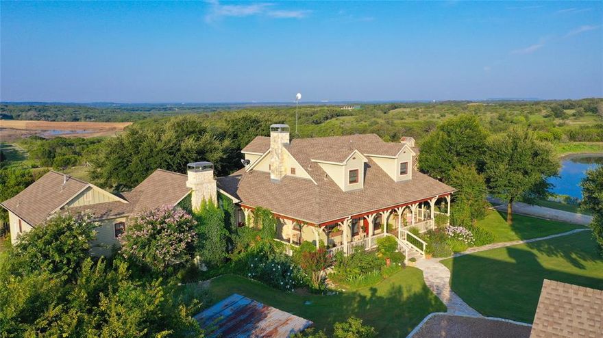 SELLERS ARE MOTIVATED!!  A beautiful home on a very private 61 acres located just 45 minutes from Downtown Fort Worth! Perfect for rural living or as a convenient weekend getaway for the family!  The one-owner home with 3 bedrooms and 3.5 baths was originally built in 2004 with a large addition constructed in 2012.  Lots of windows to enjoy the wonderful views that this property offers! Hardwood floors are throughout the home with travertine in the kitchen and bath areas. The first-floor master suite includes a large sitting area with gas fireplace, expansive bath with all the amenities. A large wrap around porch at the front of the home overlooks flowered landscaping, a 5-acre bass fishing lake and scenic 2-acre pond, while the large back porch and screened patio look south across wooded areas to the Brazos River valley. Most of the acreage is in front of the home providing seclusion from any neighbors. 
The property is associated with and accessed via Martin Creek Estates, a new luxury home development.