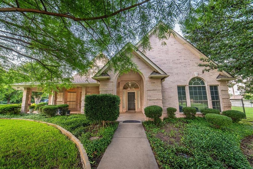 Once in a lifetime opportunity to own a stunning brick home in an upscale neighborhood.  This classic brick traditional home sits on almost two acres and beautifully landscaped offering ample space and privacy.  Nestled in a highly sought after location, you'll enjoy both the charm of a timeless design and the convenience of modern living.  This gorgeous home has five bedrooms, which includes a mother-in-law suite, 4 baths, updates that include granite, stainless appliances, amazing views of the backyard with picture windows, water well that supplies sprinkler system with a 2500 gallon holding tank, motorized shades in master, and so much more.  This home won't last so book your showing today.