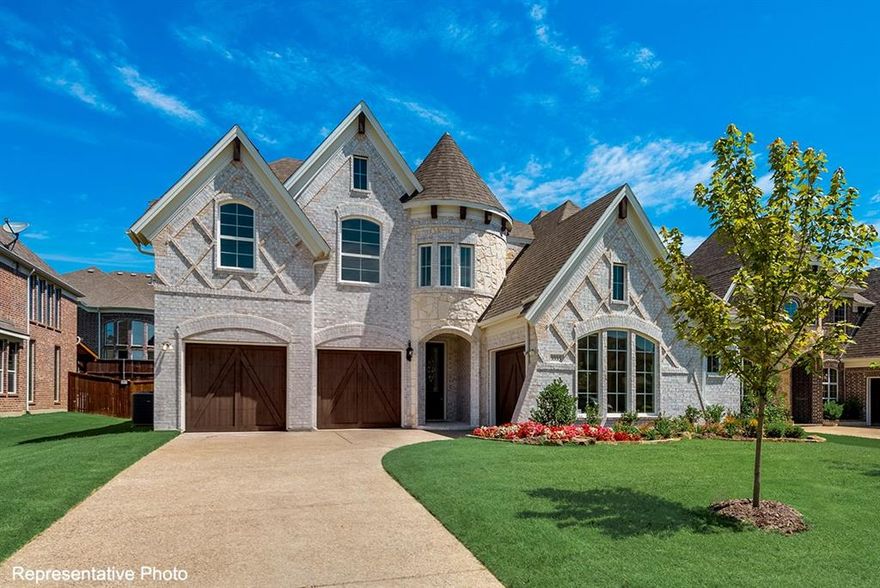 Experience luxury, comfort, and convenience in this stunning new Grand Home, scheduled for completion in November. Perfectly situated within the highly rated Mansfield ISD, this residence offers an ideal setting where all schools are just a short walk or bike ride away. Nestled between Dallas & Fort Worth, the home provides effortless access to premier shopping, dining, & entertainment options.
This Energy Star Certified property welcomes you with impressive curb appeal, an elegant eight-foot front door, and extensive hardwood flooring throughout. Inside, the open-concept layout showcases a vaulted family room with a cozy gas fireplace that flows seamlessly into a spacious covered back patio—perfect for relaxing or entertaining. The gourmet kitchen serves as the heart of the home, featuring Shaker-style cabinetry, Omegastone countertops, a five-burner gas cooktop with custom wood vent hood, stainless steel appliances, pots and pans drawers, and a generous island for casual dining or meal prep.
Designed for modern living, the home includes five bedrooms, with a convenient downstairs guest suite ideal for multigenerational families. The full oak staircase with wrought iron spindles leads to a large game room and an additional media or bonus space. The luxurious primary suite offers a serene retreat with a garden tub, dual Marlana vanities with framed mirrors, rectangular sinks, and a glass-enclosed tiled shower.
Additional highlights include eight-foot interior doors, rocker light switches, R-38 insulation, and a radiant barrier for exceptional energy efficiency. Combining style, functionality, and location, this home delivers the perfect blend of sophistication and everyday comfort in one of the area’s most desirable school districts.