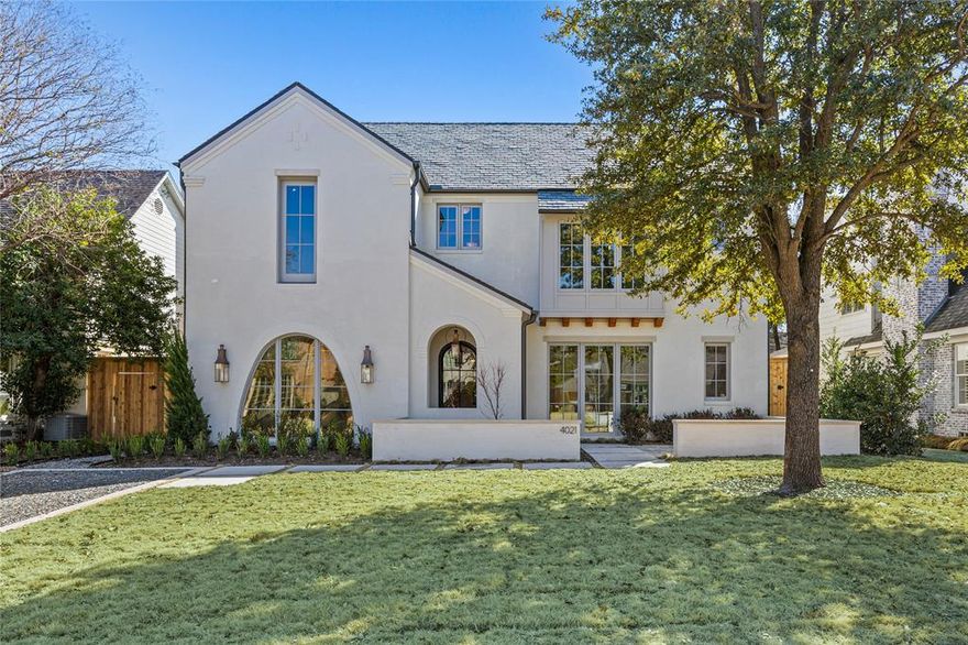 MOVE-IN READY! This exquisite 5,855 sq ft southern transitional home by JB Homes blends luxury, functionality, and quality at every step. Boasting 5 bedrooms, 5.2 bathrooms, and top-tier finishes, this home is perfect for modern living. As you enter, you're welcomed by a light-filled foyer, private office and elegant dining room flanking the entry. The dining room features custom cabinetry and wine storage, while the home’s sleek walk-up wet bar adds a touch of sophistication. The chef's kitchen, equipped with Wolf and Sub-Zero appliances, white oak cabinetry, and a spacious walk-in pantry, is a dream come true. A built-in mail station desk and a customizable breakfast nook complete the space, making it both practical and stylish. The expansive family room offers a cozy fireplace, built-in shelving. Upstairs, the primary suite is a true retreat, featuring a private seating area, fireplace, and a luxurious spa-like bath retreat with a soaking tub, steam shower, separate vanities, and an oversized walk-in closet. The downstairs guest bedroom is perfect for visitors, while upstairs, you'll find 3 additional secondary bedrooms—each with its own en-suite bath and closet—as well as a generous game room. The nano doors open from the family room to a large patio with a fireplace and motorized shades. The tranquil yard includes plenty of room for a pool. Located in the prestigious Highland Park ISD and zoned to Hyer Elementary, this home offers both style and convenience. Quality construction and gorgeous interior finishes ensure this home is as functional as it is beautiful. Don’t miss the opportunity to own this stunning new build!