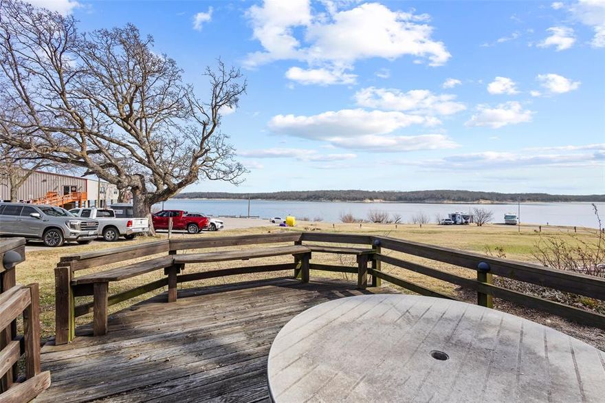 Lake Texoma Views with Marina Access

Wake up to water views and spend your evenings watching the sun settle over Lake Texoma. This 2-bedroom, 2-bath home offers 1,056 square feet of comfortable living space just steps from marina access, making it an ideal lake retreat or weekend getaway.

The inviting covered front porch sets the tone with warm wood accents and space to unwind. Inside, the layout offers an open living area filled with natural light and easy flow into the kitchen and dining space. Both bedrooms provide privacy and functionality, while the two full bathrooms add convenience for guests or family.

Outside is where this property truly shines. Multiple deck spaces create the perfect setting for morning coffee, grilling after a day on the water, or simply enjoying the wide lake views. Mature shade trees and the relaxed neighborhood atmosphere enhance the peaceful lake lifestyle this property delivers.

Located just moments from marina access, you can spend less time driving and more time on the water.

Whether you’re looking for a weekend escape, investment opportunity, or full-time lake living, this Lake Texoma property offers the simplicity and scenery buyers are searching for.

Buyer must satisfy the requirements for membership in the American Legion in order to complete the purchase.

Schedule your private showing today.