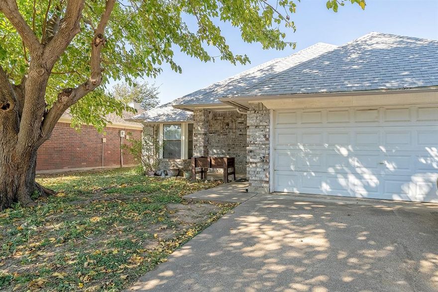 Beautifully maintained 3-bedroom, 2-bath home located in the peaceful Marine Creek Hills community of Fort Worth! This charming property offers a functional layout with an inviting living area, open dining space, and a bright kitchen perfect for everyday living and entertaining. Enjoy a spacious primary suite with a private bath, generous closet space, and comfortable secondary bedrooms ideal for family or guests.

Step outside to a private backyard with mature trees and plenty of room for outdoor dining or weekend barbecues. The home also includes an attached two-car garage and low-maintenance landscaping for easy upkeep.

Residents love the convenience of this quiet neighborhood with nearby parks, walking trails, and easy access to Marine Creek Lake. Commuting is simple with close proximity to major highways, shopping, dining, and entertainment options in North Fort Worth and the Alliance corridor.

Zoned for highly rated Eagle Mountain–Saginaw ISD schools including Elkins Elementary, Creekview Middle, and Chisholm Trail High—just minutes away! Whether you’re a first-time buyer or looking to downsize, 6329 Woodcreek Trail offers the perfect blend of comfort, convenience, and community.

Come see why life in Marine Creek Hills feels like home!