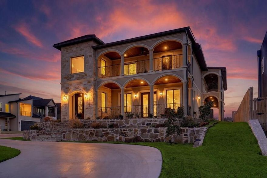 Stunning Builder’s Personal Home in Hills of Lake Country – Lakefront Community with Panoramic Views. 
Exceptional 2020 custom home built by the owner as his personal residence. Constructed with premium ICF (Insulated Concrete Forms) walls — no exterior wood framing and advanced foam insulation — engineered to withstand winds over 200 mph. Striking stucco and stone exterior with a premium Decra Villa Tile roof that qualifies for significant insurance discounts. Slab foundation over 35 piers.
Thoughtfully designed layout features a private first-floor walk-in second master suite with coffee bar. The main master suite is on the second level to capture breathtaking panoramic views and includes direct access to a wraparound balcony from the oversized game room. Luxurious master bath features a freestanding tub and large 4x5 custom shower. Additional highlights include a dedicated office, multiple balconies, and a spacious family room with gas fireplace.
Dream kitchen features custom 42-inch cabinetry, granite and quartz counters, pot filler, 5-burner gas range, kitchen peninsula, and an oversized blue island with bar seating. Beautiful bamboo hardwood floors and solid-core 8 ft doors throughout.
Located on a premium corner lot in a quiet cul-de-sac with circle drive. No mandatory HOA and loaded with great features.
This is a rare opportunity to own a high-performance luxury home in one of the most desirable lakefront communities.