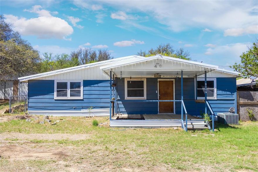 Discover the possibilities with this charming 3-bedroom, 2-bath home! Highlights include a long-lasting metal roof, efficient burn-off septic system, and a partially framed in shop with electricity. The shop offers flexibility - use it for your hobbies, create an extra bedroom, or keep it as a functional work space. Situated close to the lake, this property also boast mature trees, providing a perfect shady retreat. Come see for yourself and schedule your visit now!