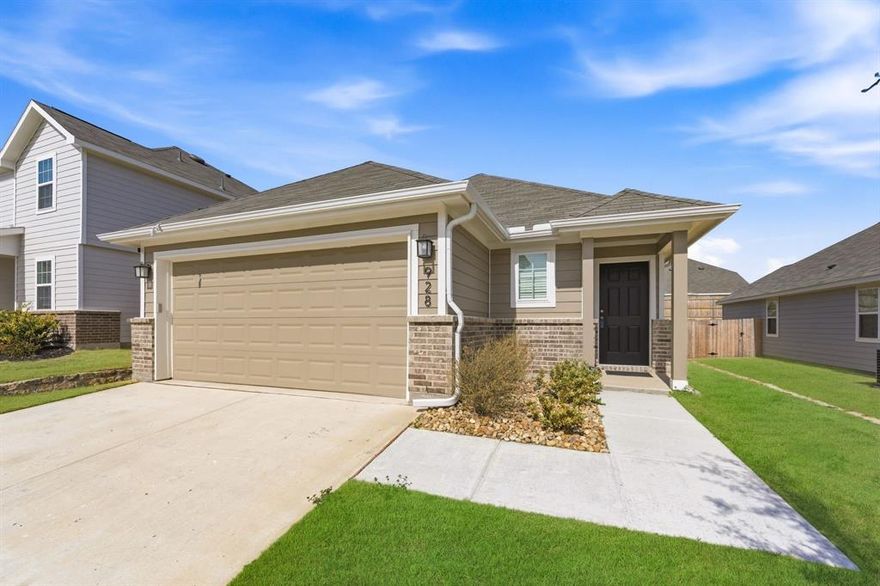 Built in 2025 and located in the highly sought-after Eagle Mountain–Saginaw ISD, this 3-bedroom, 2-bath home is move-in ready with upgrades already in place. The exterior stands out with added rock landscaping in the front flower beds and around both the front and back trees. Front lighting on both sides of the garage enhances curb appeal, while a motion-sensing flood light adds extra visibility in the backyard. Inside, you’ll find an open concept layout with a spacious living room, energy-efficient windows, a ceiling fan added in the guest bedroom, an upgraded kitchen faucet, and hand towel racks installed in both bathrooms. The layout offers a comfortable flow for everyday living, plus a covered patio and spacious yard perfect for relaxing or entertaining. Conveniently located near major highways, restaurants, and entertainment, this home combines modern features with everyday convenience.