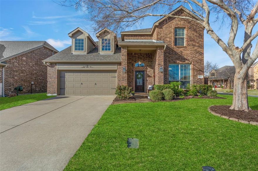 This neighborhood sets the tone for something special, offering a lifestyle that feels more like a resort than a typical community. This spacious two-story residence offers 3,725 square feet of thoughtfully designed living space with 4 bedrooms and 3 full plus 1 half bathrooms, providing plenty of room to grow, entertain, or host guests. Elegant engineered hardwood floors, granite countertops, stainless steel appliances, and timeless upscale finishes create a warm yet refined atmosphere throughout. The private office and the primary suite are conveniently located on the main level, offering both functionality and comfort. Secondary bedrooms are generously sized to accommodate king-size furnishings and each features walk-in closets. The upstairs layout includes an oversized game room that provides flexible space for entertaining, hobbies, or additional living. Movie nights are elevated in the dedicated media room where the 1080p projector, 106 inch screen, 5 channel surround sound system, and media chairs can all convey with the property.  If storage is high on your list, this home delivers with two attic spaces including a front walk-out attic for easy access. New Roof installed April 2026. Step outside to your own backyard oasis featuring a covered patio, relaxing porch swing, and spa that can convey, perfect for unwinding after a long day. Located within highly sought-after Frisco ISD, the exemplary elementary school is just a short distance within the neighborhood. Residents enjoy exceptional community amenities including four resort-style pools with water slides and jumping blocks, a splash pad, amenity center with outdoor grills, scenic pond, and community park. All of this is conveniently located near dining, shopping, and just minutes from the new PGA headquarters and the soon-to-open Universal Studios theme park.