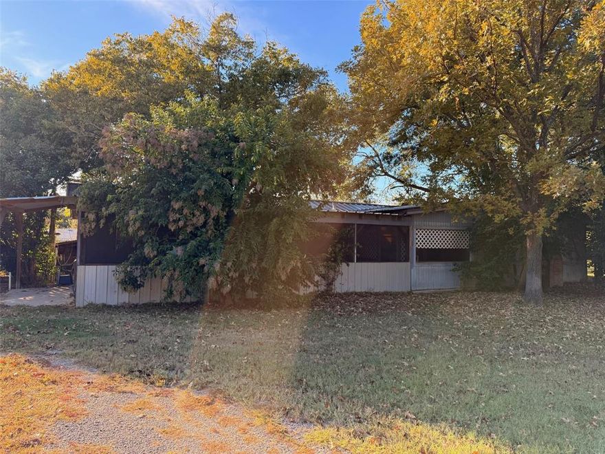 Opportunity knocks with this fixer-upper in a desirable waterfront subdivision on Cedar Creek Lake! Situated on two spacious lots totaling 0.41 acres, this property offers endless potential for investors, weekenders, or anyone ready to create their dream lake retreat.
The property features a circle drive, large workshop, an additional outbuilding, and a fenced backyard — providing plenty of space for projects, storage, or pets. There are two bedrooms, one bathroom, bonus room-office, and a large screened-in porch. The home itself needs work and will be sold as-is, but the location, lot size, and numerous beautiful mature trees make it a fantastic find.
Enjoy being super convenient to local restaurants, shopping, and lake recreation, while still having the space and privacy of a double lot. Bring your vision and transform this property into the perfect lake getaway or full-time residence! Possible owner financing - contact agent.