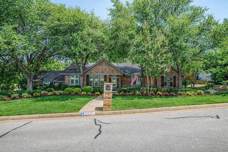 Welcome to this fantastic home with easy access to Hulen and I-20.  4 bedrooms, 2 bathrooms, 2 car rear entry garage, all on a corner lot with beautiful trees. As you enter the property, you will find a formal dining room, study or second living room with access to kitchen. Walk into a large family room with a vaulted ceiling, a brick fireplace with built-ins on both sides, wood flooring, plantation shutters and a wet bar.  Kitchen has granite countertops, an abundance of cabinets, stainless appliances, and painted cabinets. Breakfast nook off kitchen with more cabinets for storage. Primary bedroom with ensuite that has been beautifully updated with a vanity with 2 sinks that have a solid surfaced countertop, decorative mirrors, all on a shiplap wall.  Ensuite also has plantation shutters and a large walk-in shower. 3 more bedrooms, with all bedrooms having ample closet space. Beautiful backyard with turf for low maintenance, covered living area, outdoor fire pit, flagstone patio, and an additional parking space with awning for shade. A MUST SEE!!