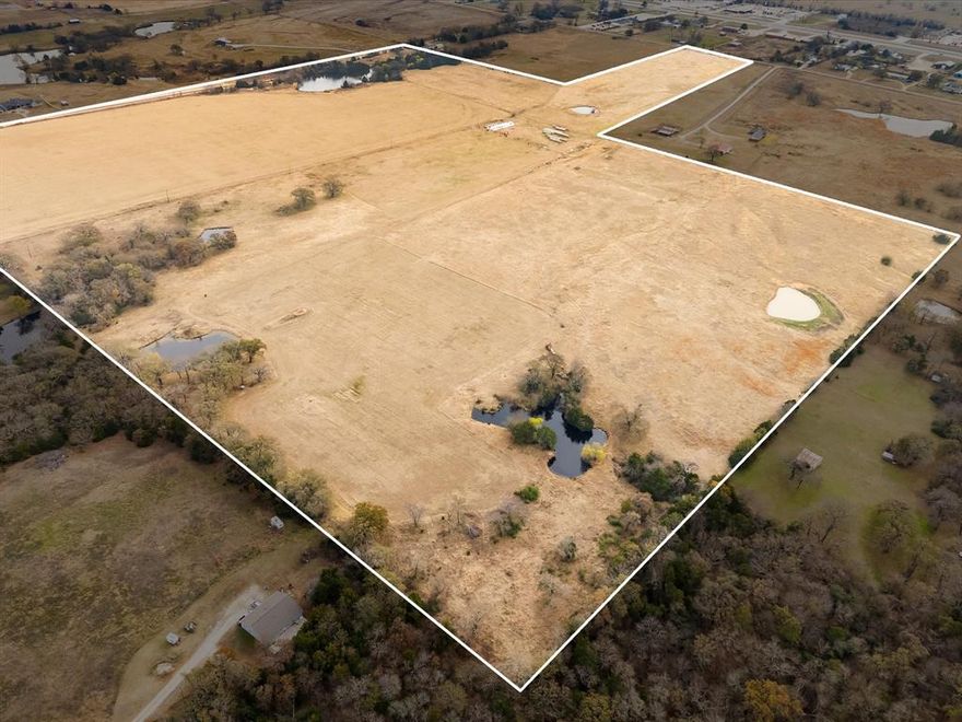 Farm, Build, or Invest – 88.2 Acres in Prime North Texas Location! Welcome to Red Top Ranch, an exceptional 88.2-acre tract of unimproved agricultural land in scenic Whitesboro, Grayson County, offering endless potential for farming, building, or future investment. This irregularly shaped property features level to gently sloping topography and lies entirely within FEMA Zone X, outside the floodplain. Perimeter fencing is a mix of welded pipe, grid wire, and traditional 5-strand barbed wire, making the property ready for immediate agricultural or ranch use. Several spring-fed stock tanks are scattered across the land, along with a picturesque 1.65-acre pond located at the eastern edge of the property, enhancing its functionality and appeal. Whether you're envisioning a private ranch, a productive farm, or a future residential development, Red Top Ranch delivers the perfect blend of rural tranquility and location convenience. With access off Sadler Road just minutes from Highway 82, the property offers easy connectivity to Sherman, Gainesville, and Lake Texoma—making it an ideal opportunity for quiet country living with city amenities close at hand.