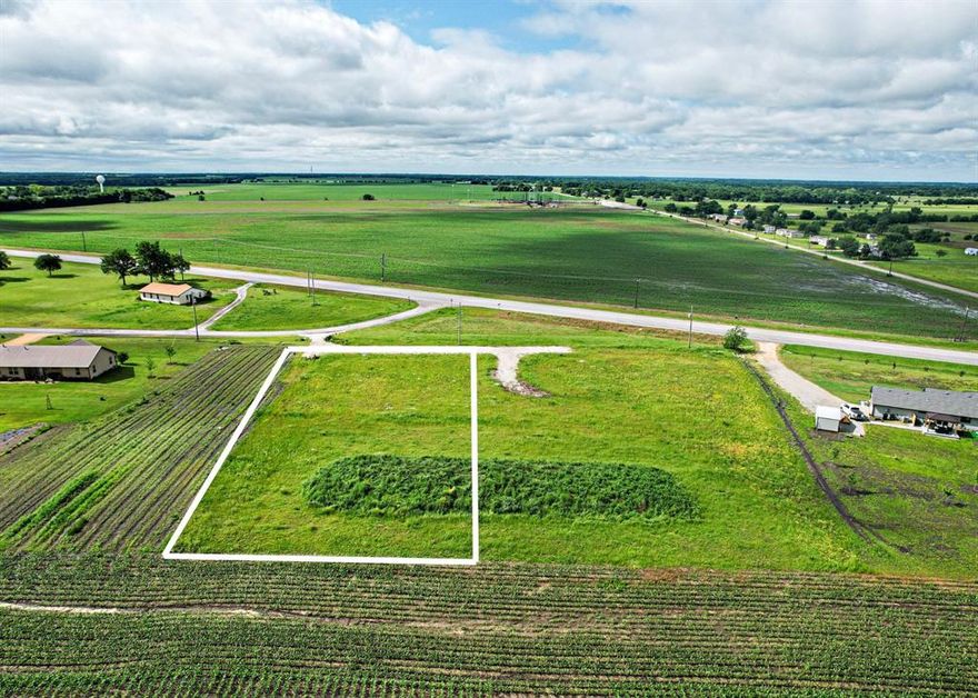 Don’t miss this one-acre residential lot on McCartney Way, just off Hwy 11 in Whitewright, TX. Enjoy peaceful country living with close access to nearby cities and recreational destinations—only 20 minutes to Sherman, 40 minutes to McKinney, and just 40 minutes to Bois d’Arc Lake for fishing, boating, and outdoor fun. This property is build-ready with water and electric on site, plus a rock driveway already installed. Perfect for your dream home or as an investment opportunity. Lot 2 is also available for purchase MLS 20928835—buy both for added space and flexibility!