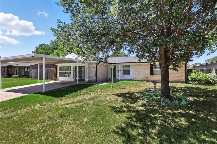 Absolutely wonderful 3-2-2-car carport on large corner lot in convenient Rancho North Addition of Saginaw! The very open, light and bright floorplan with 2 huge living areas and large bedrooms makes this the perfect family home! The galley kitchen with breakfast bar overlooks huge main living area with built-in bookshelves & a wbfp, as well as the large breakfast area. The home is adorned with terrific wood-look tile, ceramic tile and wood floors, lots of neutral colors, a large formal dining-office area, as well as the huge second living area-game room which is perfect for relaxing or entertaining, or however you choose to utilize this amazing space! The sturdy carport allows for protection for your vehicles as well. Brand new roof and gutters! Come see this one today, it won't last!!