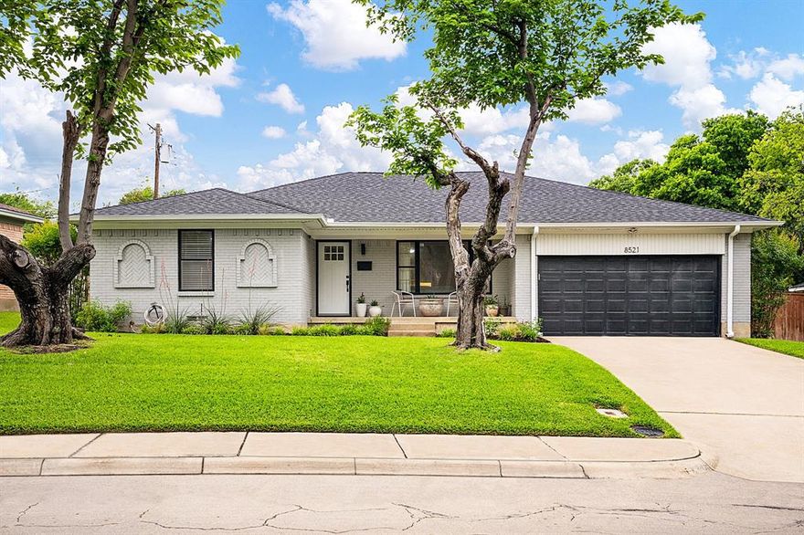 Beautifully updated home on a large elevated lot in the sought-after Claremont subdivision of East Dallas, offering great curb appeal and ideally positioned along a winding street just moments from White Rock Lake and the Dallas Arboretum. This inviting home greets you with a wall of built-ins as you walk through the door and features a functional layout with separate living and dining areas, and abundant natural light. The kitchen is thoughtfully updated with quartz countertops and refreshed cabinetry, opening seamlessly to the living areas, ideal for both daily living and entertaining. Hardwood flooring, generously sized bedrooms, and ample storage add comfort and functionality throughout. The primary suite includes a beautifully renovated en-suite bath. The roof was replaced in Oct 2025; attic insulation was added in 2024; updates to the HVAC system, a tankless water heater, and the front fence were completed in 2022. With easy access to city parks, amazing East Dallas shopping and restaurants,  Downtown, and major highways, this home delivers both style and convenience in one exceptional package.