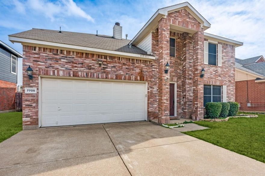 Welcome to 7705 Tin Cup Drive in Southeast Arlington — where space, flexibility, and location come together with no HOA restrictions. This well-maintained two-story home offers 5 bedrooms, 2.5 baths, and multiple living areas designed for everyday living. Whether you need room for a growing household, guests, or a dedicated work-from-home setup, the layout gives you options without sacrificing comfort. Downstairs features two spacious living areas plus a versatile flex room ideal for a home office, playroom, or media space. The open-concept kitchen connects seamlessly to the main living area and includes stainless steel appliances, a generous center island with breakfast bar seating, and ample counter space for meal prep and entertaining. Upstairs, the private primary suite offers a relaxing retreat complete with a garden tub, separate shower, and walk-in closet. Four additional bedrooms provide plenty of space for family or guests. Step outside to a large backyard with an open patio ready for weekend gatherings, summer barbecues, or quiet evenings at home. Plus, home has a large storage unit that conveys with the property. Located within walking distance to Bowman Branch Park and scenic trails and zoned to highly regarded Mansfield ISD. No HOA. No added restrictions. Just space, comfort, and flexibility in a prime Southeast Arlington location.