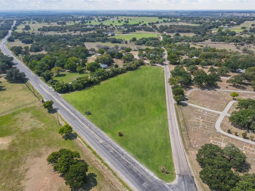 COMMERCIAL POTENTIAL on Bethel Road!  3.217-ACRE corner lot with HIGH VISIBILITY and dual access!  NO CITY TAXES and NO DEED RESTRICTIONS. Property lies outside Weatherford city limits but within the city’s ETJ.  Featuring 459’ of road frontage on Bethel Rd (FM 1884) with a TXDOT traffic count of 3,760 vehicles per day, plus an additional 667’ of frontage on Lution Dr.  Dual access makes the property ideal for customer entry and exit, deliveries, and site design options. Over 3 acres, LEVEL and CLEARED, provide ample space for your building footprint plus parking.  Located approximately 2 miles south of I-20 in Weatherford’s fast-growing south side, it provides excellent access and exposure for your future business.  Currently in ag use for hay production, this corner tract is a blank slate in a high-growth area.  Buyer to verify allowable uses and development requirements.