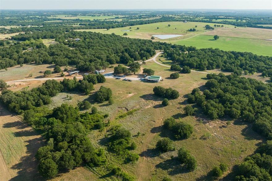 This is a diverse property improved with a Barndominium. It is located 3.5 miles east of Sunset in Montague County. The land has approximately 60 acres of cultivation with the balance being heavily wooded. Topography is level to rolling offering impressive views. There are 3 stock ponds, Couch Branch Creek extends through the property, interior cross fencing, pens, loafing shed with tack room. The Barndominium consist of 1,600 sf, built in 2015, 2 bedrooms, 2 baths with an attached carport and covered patio. The 4S Ranch would make a great investment for an avid outdoorsman looking to hunt as well as a great weekend get away with all the amenities to bring along the whole family.  Whether it be hunting, fishing, ATV riding, or just a weekend getaway, the 4S Ranch offers something for the entire family.