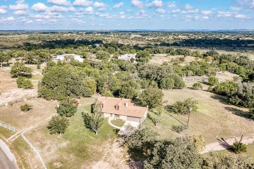 This two-story, 1776 Sq Ft, 4-bedroom, 2-bath home is located in the desirable Flying S Ranch, just four miles from the center of Lampasas. Situated in Burnet County, yet conveniently located on the Lampasas ISD school bus route. Sitting on 8.25 acres of tree-covered land, the residence offers plenty of privacy and room for hunting, recreational activities or raising and enjoying animals. Inside, the home feels fresh and new with a recent remodel that includes fresh paint, new carpet, and updated fixtures & appliances. An attached screened sunroom offers a peaceful spot to relax and enjoy nature. A large two-car garage provides ample space for vehicles, and the detached carport allows for overflow storage as well. The Flying S Ranch has proven to many families over the years to be a wonderful neighborhood to raise children or enjoy retirement. Come take a look today!