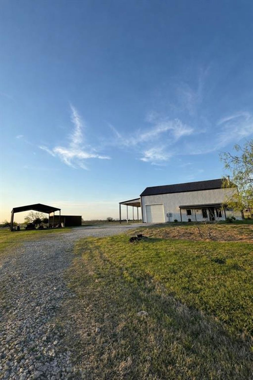 Set on 18.3 fenced and cross-fenced acres with a solar-powered gated entry, this AG-exempt property offers space, function, and privacy with cattle as the primary use and no HOA. Ideally located just minutes from Interstate 20 and U.S. Highway 175, commuting to Dallas is a breeze.

The property features a 2.5-acre pond reaching depths up to 25 feet, stocked for the past 6 years with catfish, Florida trophy black bass, native and hybrid bluegill, and redear varieties, perfect for fishing and outdoor enjoyment. A covered RV parking area with septic hookup and 50-amp electrical, detached carport, and lean-to parking provide excellent functionality. The attached workshop is wired with 30-amp service for a welder, and an approx. 15x20 partially enclosed barn adds even more versatility.

Inside, natural light pours through picture windows, highlighting polished concrete floors in the main living areas. The kitchen offers butcher block countertops, a center island with built-in bench seating, and peaceful pond and sunset views. The main-level primary suite opens to a spacious back patio, ideal for relaxing and enjoying the surroundings, while granite countertops elevate the bathrooms. An upstairs loft provides flexible space for work or play.

With approximately 1 acre designated as a homestead and an additional 17 acres AG-exempt, this one-of-a-kind property blends country living with modern comfort. Schedule your tour today and experience it for yourself.

Discounted rate options and no lender fee future refinancing may be available for qualified buyers of this home.