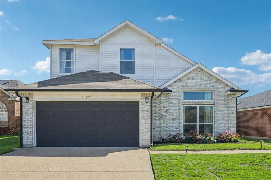 You Tube 5309 Manhassett for a full video walk-through! The two-story home offers a spacious layout designed for comfortable everyday living and flexible use of space. The main living area welcomes you with warm wood-style flooring, natural light, and a striking fireplace feature wall that creates an inviting space for relaxing or entertaining. The layout flows easily into the dining area and kitchen, where ample cabinetry and practical workspace support daily routines and gatherings.

Upstairs, the bedroom arrangement provides privacy and versatility, including a flexible room ideal for a home office, guest space, or hobby room. The primary suite offers a private retreat with an ensuite bath featuring dual vanities, a soaking tub, a separate shower, and generous closet space.

Step outside to a backyard designed for relaxation and entertaining, complete with a covered patio for shaded outdoor living, open lawn space to play or for fun activities, and a super cool stock tank plunge pool perfect for cooling off during warm Texas days.

Convenient access to major highways, shopping, dining, parks, and everyday amenities makes commuting and daily errands simple.