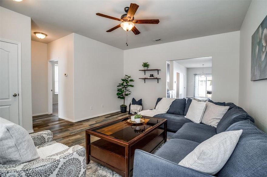 Well-Maintained, beautifully updated home in a prime location! Across the street from incredible amenities like Tennis and Pickleball Courts, Community Pool, Lake with walking path, Skatepark, and Community Center! Monaco Elementary is one street over and easy walking distance. The convenience is unmatched, while still in an idyllic, peaceful setting that makes friendly Providence Village so special. Only on it’s 2nd owner, this home has been thoughtfully updated with fresh paint throughout, wood look tile flooring, and carpet in bedrooms. Open Floorplan with Primary bedroom separate from secondary bedrooms. Kitchen and Dining room overlook the backyard. Kitchen has rich, espresso cabinets and granite countertops, deep, divided sink, built in microwave, pantry and eat-in kitchen style dining room. Primary bedroom fits a king size bed perfectly, with walk-in closet and ensuite bath. Primary bath includes separate shower and garden tub, and dual sinks. Must see to appreciate this warm and inviting home. Smart Doorbell stays. Energy efficient solar panels are owned free and clear and will be transferred to the buyer. Solar inverter replaced Oct 2025. Roof replaced summer 2020. USDA Eligible for 0% down financing!