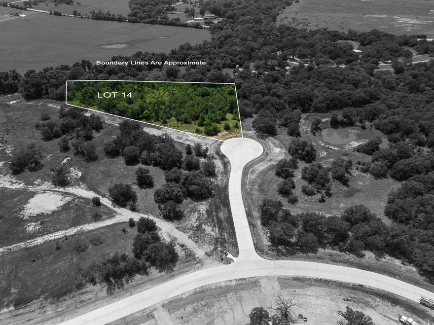 Set within the picturesque landscape of Encanto Estates, this 2.074-acre homesite offers a rare blend of serenity, space, and thoughtful positioning on a quiet cul-de-sac. Located in Azle, Texas, the property provides an ideal canvas to design a custom residence that seamlessly integrates luxury living with the surrounding natural beauty. Expansive in scale and tranquil in setting, it invites a vision defined by privacy, panoramic views, and refined outdoor living—whether that means a modern retreat or a timeless estate designed to evolve for years to come. Encanto Estates represents an opportunity to build with intention, where peaceful surroundings and elevated living come together effortlessly.