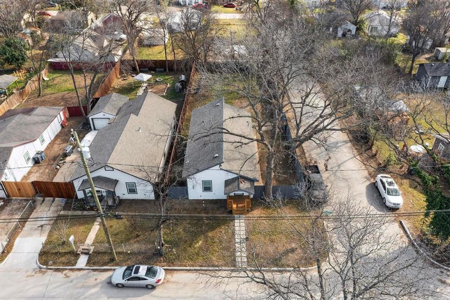 Completely remodeled corner lot home offering modern finishes, thoughtful upgrades, and exceptional functionality. Exterior highlights include a sliding metal side gate allowing convenient access and an oversized backyard, ideal for work vehicles, equipment storage, or additional outdoor use—making this property a great option for homeowners or business owners needing flexibility. This property has been fully gutted and rebuilt with no shortcuts taken. All major systems have been replaced, including new plumbing, electrical, HVAC system, roof, and pier & beam foundation work—providing peace of mind for the next owner. The interior features a bright, open layout with updated fixtures, finishes, and brand-new appliances throughout. The home offers three bedrooms and two full bathrooms, designed for both comfort and efficiency.