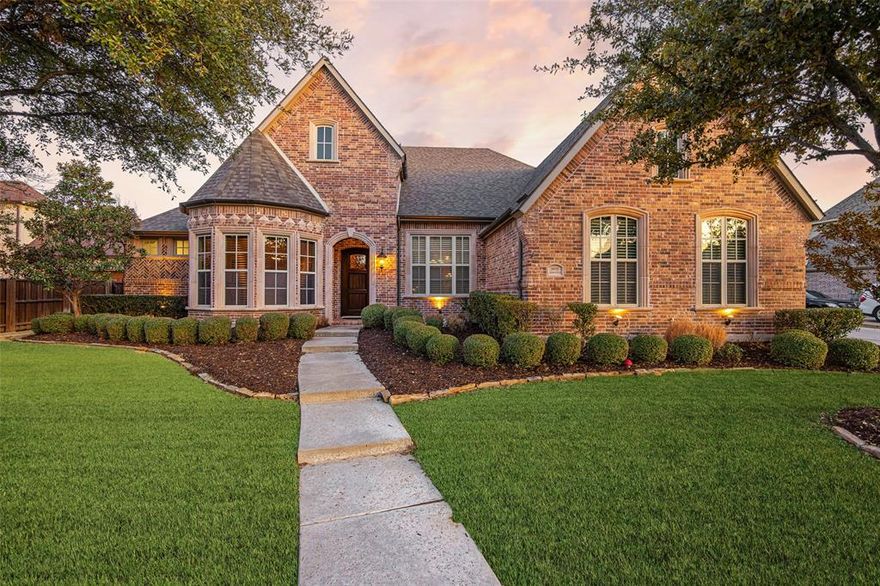 Rare opportunity in the exclusive gated Shores At Waterstone. One-Owner, built by Drees. Well maintained. Single-story. Zoned for Frisco ISD, one of the area’s most sought-after communities. Every inch of this residence exudes a sense of calm, comfort, and timeless charm. Featuring elegant wood floors, multiple living and dining areas, including a spacious den with cozy fireplace designed for gatherings and everyday living. Executive-style office filled with natural light from the bay windows and French doors allows for privacy and productivity.  Entertain family and friends with the latest movie or sports event from your media room situated within snacking distance just off the kitchen and the dry bar with lattice wine rack and wine fridge. Whether you're a gourmet cook or novice foodie the large kitchen, walk-in pantry and oversized island is the ideal workspace for your culinary creations, easily served in the breakfast nook or formal dining room. Retire to your luxurious primary suite encompassing the east-wing of the home. Peaceful secluded ensuite includes built-ins, dual sinks, garden tub, separate shower, and walk-in closet. West-wing of the house is perfect for kids wanting a game room, or multi-generational families needing a separate living area. Two-bedrooms boast ensuite baths, and a third bedroom offers adjoining bath accessible to the hallway. Summers will be a SPLASH in your waterfall and fountain featured pool complimented by attached spa. Fenced backyard and covered patio provide room for kids and pets creating an outdoor retreat for the whole family. 
Resort-style amenities: community pool, splash park, clubhouse, fitness center, private lakes for fishing and picnics. Enjoy scenic walking and jogging trails, playground. Convenient access to Lake Lewisville for boating, as well as nearby golf courses and the Frisco Star. Shopping, Dining, Entertainment, Sport Events. 6-miles from Medical City Frisco Hospital. Welcome Home.