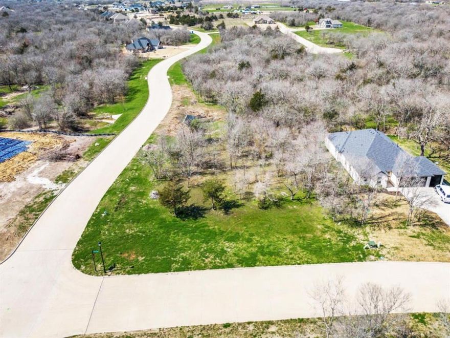Beautiful 3-bedroom, 2.5-bath home on 3 acres in Royse City, TX (75189). This modern-traditional style home features an open-concept layout with high ceilings and plenty of natural light throughout. The spacious living area flows into a large dining room and a kitchen with a center island, modern appliances, and generous cabinet space — perfect for family gatherings or entertaining guests. The primary suite includes a large walk-in closet and a private bathroom with dual sinks and a walk-in shower. A hidden room, accessible through the master closet, offers the perfect space for a home office, hobby room, or extra storage. Two additional bedrooms share a convenient Jack-and-Jill bathroom, and there’s also a half bath for guests. Enjoy outdoor living on the covered backyard patio with a built-in fireplace — perfect for relaxing evenings or hosting friends and family. The 3-acre lot offers plenty of space for kids, pets, or future additions like a workshop or pool.
Additional highlights include:
 - Walk-in closets in every bedroom
 - Open-concept design
 - High ceilings throughout
 - Modern-traditional finishes
Located just minutes from downtown Royse City, local schools, and shopping, this home offers the perfect blend of peaceful country living and modern convenience.