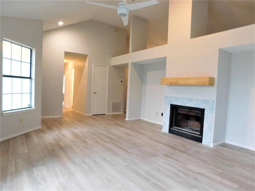 NEWLY RENOVATED! 3 bedroom, 2 baths, 2 living areas on culdesac street. New flooring, fresh paint, updated bathrooms and kitchen with new countertops, stainless steel appliances, ceiling fans in bedrooms & living rooms, decorative lighting. Enjoy the kitchen lighting equipped with BlueTooth speaker. Nest thermostat. Large primary living area boasts tons of natural light, tall ceilings & decorative fireplace with wooden mantle. Secondary bonus living room is oversized, could be used as an additional bedroom, gameroom, office, etc! Large covered back patio and private fenced backyard. Oversized utility room. Fresh landscaping. Well established neighborhood. Refrigerator, washer & dryer will stay for tenants' use.