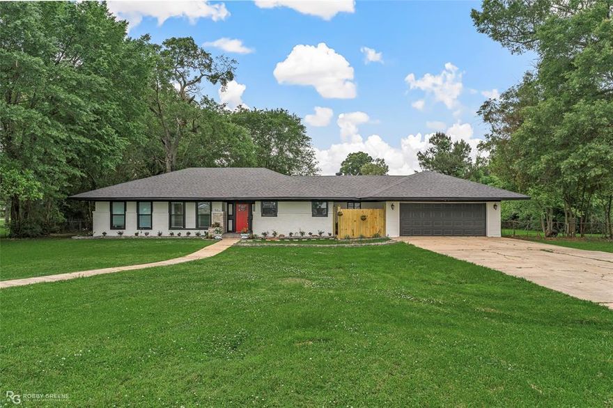 Completely remodeled 3-bedroom, 2.5-bathroom home in the heart of Benton. Stunning landscaping and fresh exterior paint offer a great first impression, and as you step inside, you'll notice that the attention to detail continues throughout. The front foyer opens into the spacious living room, complete with built-ins and plenty of natural light thanks to the gorgeous picture window overlooking the expansive backyard. The brand-new kitchen will make meal prep a breeze with its huge center island, new stainless appliances, and sleek countertops. Each of the three bedrooms is massive, offering plenty of space for family or guests, or maybe even the flexibility to have a dedicated office or study. The two full baths have been completely redone with modern vanities, fresh paint, and custom tilework. Additionally, the utility room is oversized and features its own utility sink to make household chores easy. The heated and cooled workshop and storage area in the garage are the perfect spots for projects or storing your tools and equipment. Outside, the back deck has been completely rebuilt, making it a great space for hosting BBQs or just enjoying time outdoors. The backyard offers plenty of room for a garden, playset, or maybe even a pool. Located in Benton schools just a short distance from shopping and dining, this property could be your next dream home. Don't wait, schedule your private tour today!