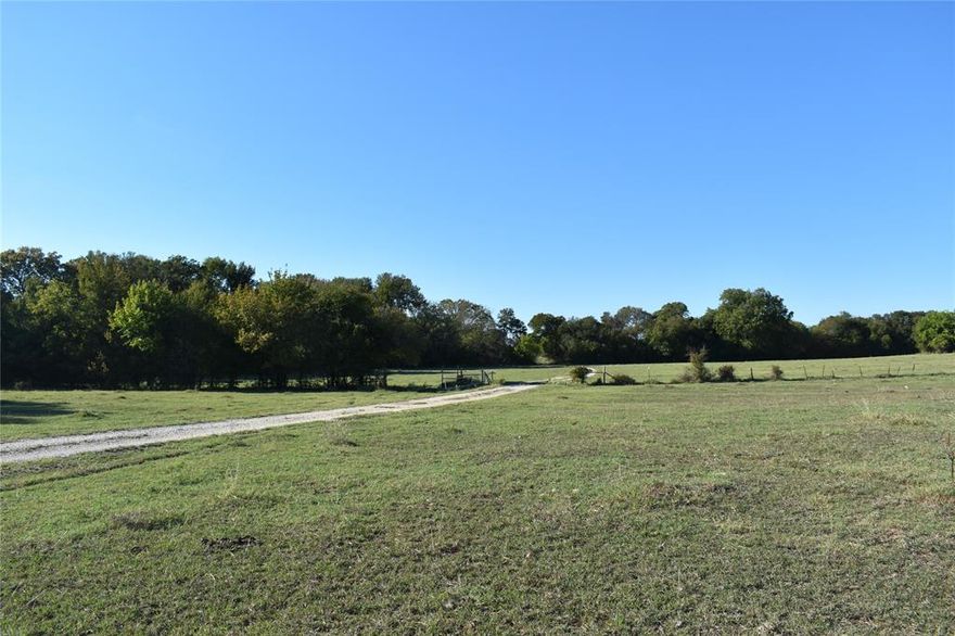 Character abounds in this 140 acre spread perfectly located between Grandview and Cleburne.  Sandy soil for your horses, lush pastures & 3 stock ponds to sustain your livestock.  Creeks meandering throughout offer thick tree cover for deer and wildlife. Multiple building sites to place your secluded, dream home overlooking the conservation lake where you can always wet a hook to catch your dinner. Not to forget that this property, with Ag Exemption, is located in Grandview ISD.  County Road and Farm Road frontage. Totally fenced.  Travel made easy to any where in the Central Texas area from this site.