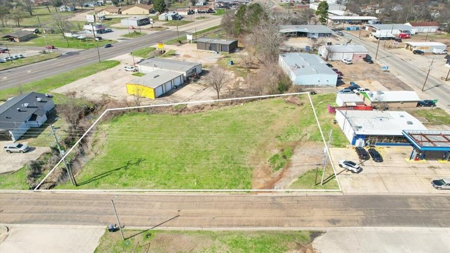 Rare Find! Conveniently located 0.71 acre lot right off Ferguson Road close to restaurants, shopping, and convenient stores making it the perfect commercial building site! Great location for commercial, retail, or an office space with endless potential for you and your business!