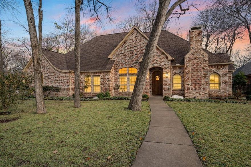 Tucked away in one of Fort Worth’s hidden-gem, guarded communities, this inviting home offers a thoughtful layout, beautiful finishes, and a peaceful setting. The open floor plan is enhanced by warm wood flooring and multiple living and dining spaces designed for both everyday comfort and entertaining. A private study with French doors and a cozy fireplace provides the perfect work-from-home or flex space, while the formal dining room and sunny breakfast area offer options for any occasion. The kitchen is a true standout with granite countertops, abundant cabinetry, a breakfast bar, and a large pantry, ideal for cooking, hosting, and gathering. The split-bedroom layout ensures privacy, with the spacious primary suite overlooking the lush backyard and featuring an updated bath with separate shower and walk-in closet. A second living area offers endless possibilities as a game room, media space, or casual hangout. Step outside to a serene backyard retreat with a covered patio and mature landscaping, perfect for relaxing or entertaining. Home has a built in Tesla Charger. Home is within a guarded, gated community, this home blends comfort, functionality, and a tranquil lifestyle in a sought-after setting.