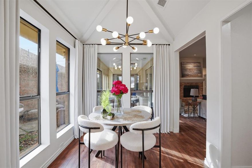 Welcome to 6500 Spur Ranch Ct in Plano, tucked on a quiet cul de sac and packed with character and style. This light filled home has been thoughtfully refreshed with warm wide plank flooring, crisp paint tones, modern lighting, and striking architectural wall trim that gives every space a custom feel.
The living room is a true centerpiece with a cozy brick fireplace, built in shelving, and expansive windows that connect the indoors to a relaxing enclosed patio, perfect for morning coffee, a playroom, or a year round lounge. The kitchen features vaulted ceilings, abundant cabinetry, granite counters, a full tile backsplash, stainless appliances, that keeps everyone together while you cook and entertain. A bright breakfast nook sits just off the kitchen and looks out to the yard.
Unwind in the spacious primary suite with an updated bath offering dual vessel sinks, granite counters, a skylight, and a large walk in shower. Secondary bedrooms are inviting and versatile for guests, kids, or a home office.
Step outside to a private backyard retreat with a large patio for grilling and gathering, plus a raised deck lounge with shade sail and string cafe lights under a beautiful mature tree and clean landscaping complete the space. Convenient to shopping, dining, and major routes, this one is move in ready and easy to love