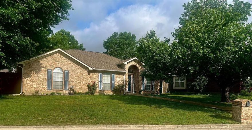 Charming 3-bedroom, 2-bath home on a spacious double corner lot. The inviting floor plan is ideal for both everyday living and entertaining. The kitchen offers a warm, functional layout with plenty of cabinet space and opens to a comfortable living room featuring a cozy wood-burning fireplace. Natural light fills the home, adding to its welcoming feel. Recent improvements include a roof that was less than 3 years old as of December 2022 and a new fence installed in June 2024, offering peace of mind and added privacy. The large, tree-shaded backyard provides a peaceful retreat with a covered patio and a convenient storage building. A truly inviting home you’ll want to experience in person.