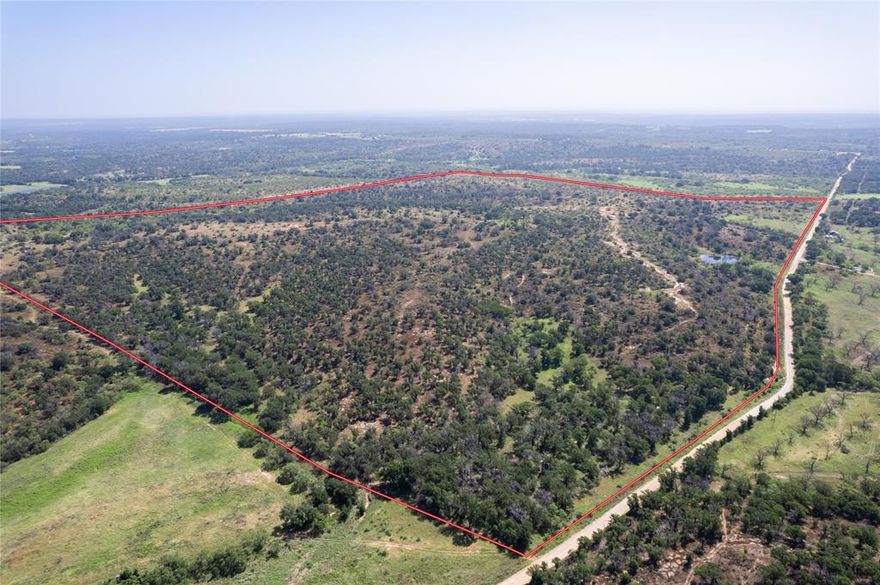 Prime time to own this versatile property located in San Saba County, renowned for its large Whitetail deer. 346 acres boast of varied elevation, two valleys with a farmhouse, tank that is situated below one of the highest points, offering expansive views. Approximately 110 miles from Austin, the land is dotted with large, native trees of San Saba County. Its elevated ridges are ideal for hunting stands and feeders, making it an excellent location for top-tier hunting camp can be placed on this land that promise great fun for the entire family. The property is equipped with electricity and has access to community water at the road. The aerial drawing provided is approximate and not for legal purposes additional land to make it 347 plus or minus acre tract beside the tract is added but not shown.  Contact the agent for more details and to arrange showings. The acres are estimated and could be more or less.  New survey will be needed.