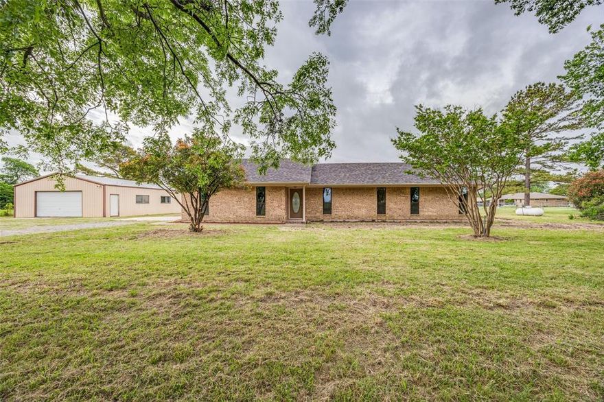 Home completely remodeled in spring of 2026.  New Paint, floors, appliances, countertops, tile, MNew hot water heater. All new windows throughout.  Home sits on 1.27 acres with a large shop that also has living quarters with full bath.  Do not miss this opportunity for peaceful life with tons of room to work and play just outside of Sherman and all its conveniences.  WRONG KEYSTROKE WHEN ORIGINALLY ENTERING.  THE ORIGINAL LIST PRICE WAS ALWAYS $326,000.00