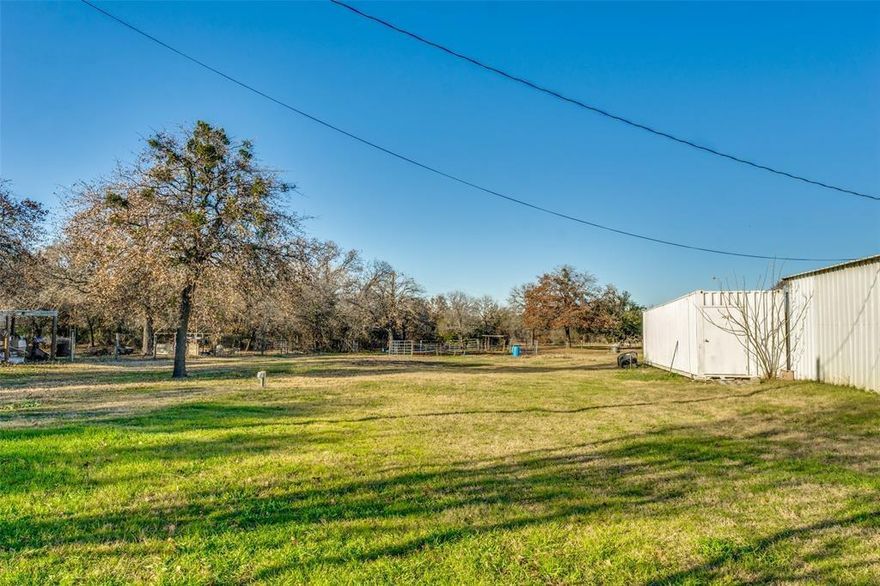 Pursue your dreams on these 8 acres of private, versatile North Texas land. Let your livestock roam on 6 acres of open land or sneak away into 2 acres of dense woods in the back of the property. The property is equipped with several modern conveniences such as RV hookups, sturdy metal barn, a convenient carport with garage storage, and a small metal storage building. Just a brisk drive to Fort Worth, Dallas, Denton, or just a few minutes from Texas Motor speedway, you can enjoy the quiet country lifestyle but remain just minutes from the modern conveniences of the big city. Property currently holds an agricultural exemption.