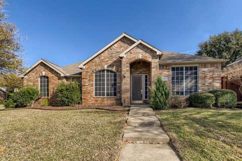 Photo of 9028 Enchanted Ridge Drive, Plano, TX 75025 (MLS # 21365939)