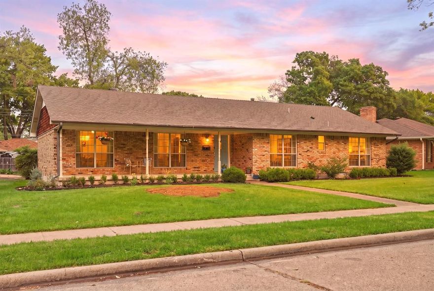 Highly sought-after single-story home in Eastwood Estates! This amazing home has been thoughtfully updated throughout. It is tucked away on a quiet, tree-lined street and boasts mature landscaping and excellent curb appeal that features an inviting covered front porch that is perfect for relaxing, enjoying greenbelt views, and connecting with neighbors in this peaceful, tranquil community. Inside, natural light fills the home, highlighting beautiful light hardwood floors throughout. The remodeled kitchen is a chef’s dream, boasting high end Wolf appliances, abundant custom cabinetry, quartz countertops, a built-in Sub-Zero refrigerator, and a gas cooktop—perfect for entertaining or family meals. The spacious living room includes vaulted ceilings, a brick fireplace and built-ins, creating a warm and inviting space for gatherings or quiet evenings. The primary suite serves as a private retreat, complete with a luxurious ensuite bathroom that has been completely reimagined with walk in closet, soaking tub, large shower, dual vanities and will please the most discerning buyers. Two additional bedrooms share a remodeled Jack-and-Jill bathroom, offering plenty of space for family or guests. Other features include a powder bath, mudlockers, attached two car garage, Additional parking spaces in back. Perfectly located just minutes from major highways, White Rock Lake, Dixon Branch park, shopping, restaurants, this home combines convenience with tranquility. Charming, unique, and move-in ready—act fast, this Eastwood Estates gem won’t last long!
