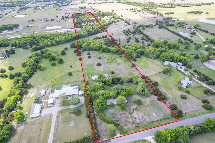 13.62 ACRES OF UNTAPPED POTENTIAL IN COMMUNITY ISD! 

Escape to the rolling landscape of Farmersville with this expansive 13.62-acre tract located in a sought-after area. If you’ve been searching for the perfect canvas to build your dream estate or an investment project, this is it.

The property includes a 2,128 sq. ft. manufactured home (built in 2001) that has been vacated and requires removal or restoration and clean-up. The property is priced specifically to reflect the property's as-is condition and the need for debris removal.

Property Highlights:
Prime Land: Over 13 acres of versatile acreage with a private, serene feel.
Water & Storage: Includes a small pond perfect for local wildlife or livestock, and a functional barn for equipment and storage.
Location: Enjoy the peace of country living while staying within the Community ISD boundaries.
Flexibility: No known heavy restrictions—bring your horses, your cattle, or your blueprints for a custom home.

With a little sweat equity and a vision, this property can be transformed into a premier North Texas homestead.