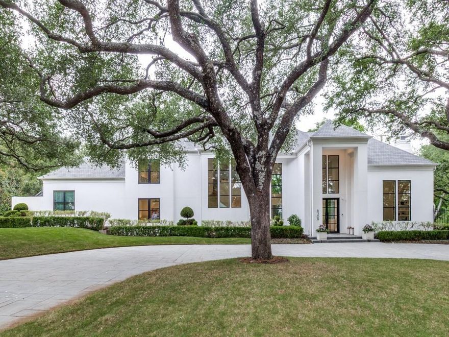 This stunning soft contemporary private retreat is designed to capture the beauty of this heavily treed private lot.  Sophisticated, timeless and designed to stand the test of time.  Almost every room is designed to capture the natural light and views of the ever changing landscape.  Remodeled professionally in 2021 by a well respected Dallas builder with an enduring sense of style. Gently lived in and meticulously maintained by the currently owners.  The primary bedroom suite and guest suite are on first level along with the study and exercise room.  Three additional spacious bedrooms with ensuite and a living area are upstairs.  The kitchen features extensive built-in appliance package, custom cabinets with quartzite countertops and an oversized island.  The butler's pantry extends the functionality of the kitchen for entertaining.  This home has a 4 car garage and an abundance of storage.  A truly spectacular property in a conveniently located north Dallas neighborhood.