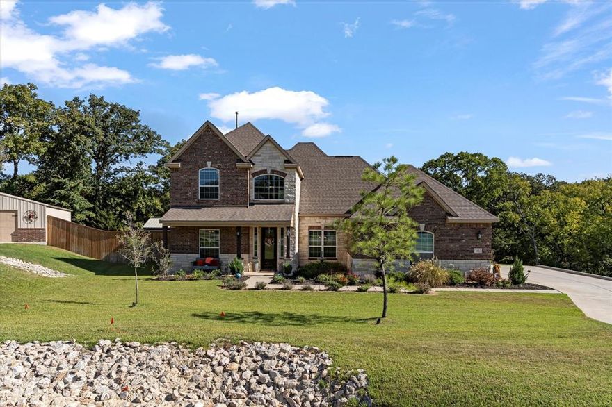 Multiple offers received highest and best by Sunday at 6 Pm. Situated on one of the best lots in North Texas this beautiful four bedroom home sits exclusively on a corner Lot. Step inside this home and you will first notice the custom hardwood floors and wonderful floor plan. Tons of windows allow an ample of natural light. This home is highlighted by a beautiful kitchen, featuring stainless steel appliances, island, granite countertops, and an abundance of cabinetry. Two bedrooms downstairs with full bathrooms makes this floor plan ideal. Upstairs two more bedrooms and a second living room is perfect under any circumstance. Step outside and be amazed by this beautiful lot overlooking mature pine and oak trees. Brand new custom saltwater POOL, concrete decking, Hot Tub, outdoor Kitchen, and covered custom bar, Fire pit, are just some of the incredible backyard features. .64 acres, 3 car garage. 40 minutes from anywhere in DFW, Low Taxes. Too many upgrades to list…